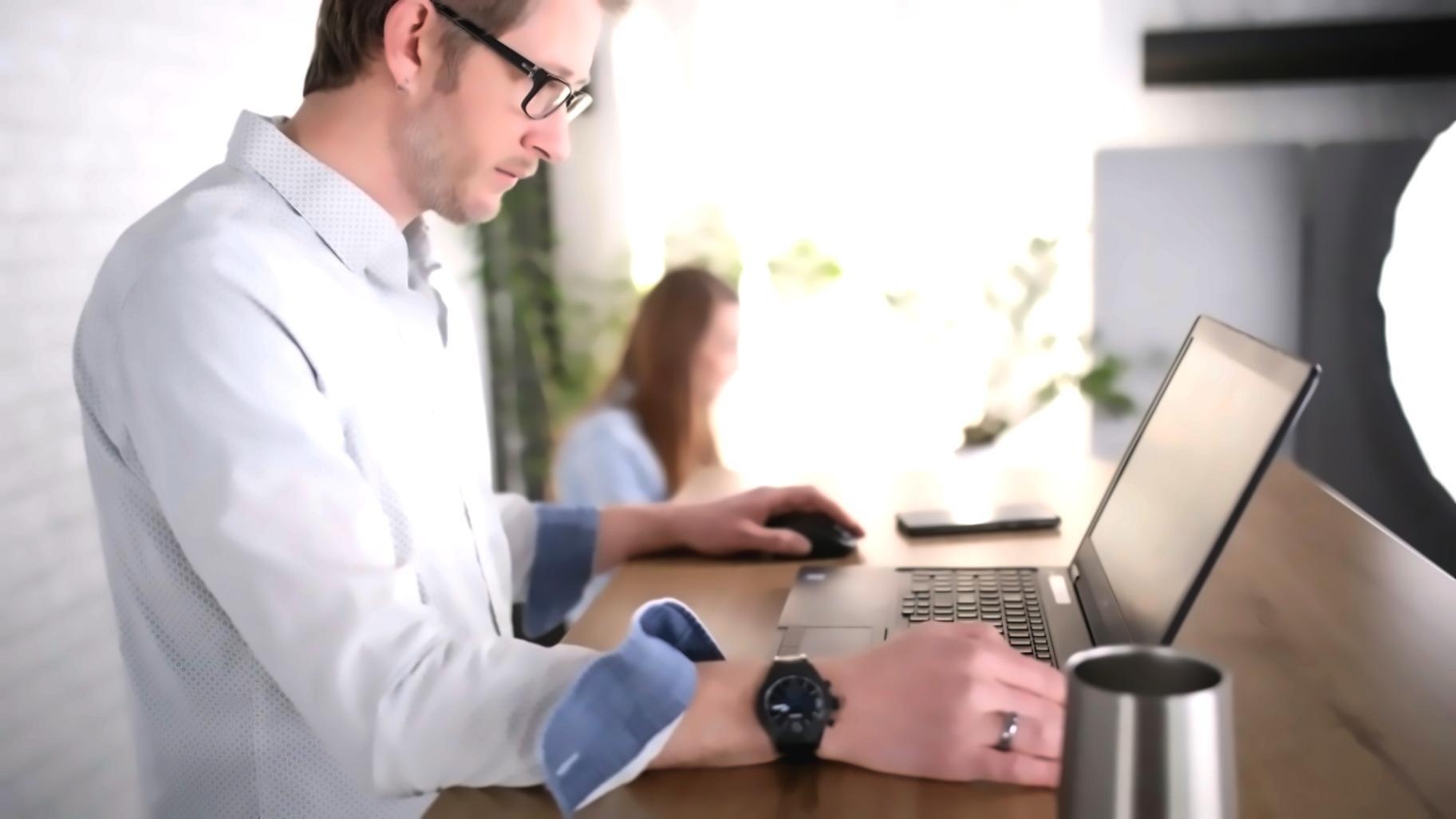 Business course graduates celebrating completion with certificates